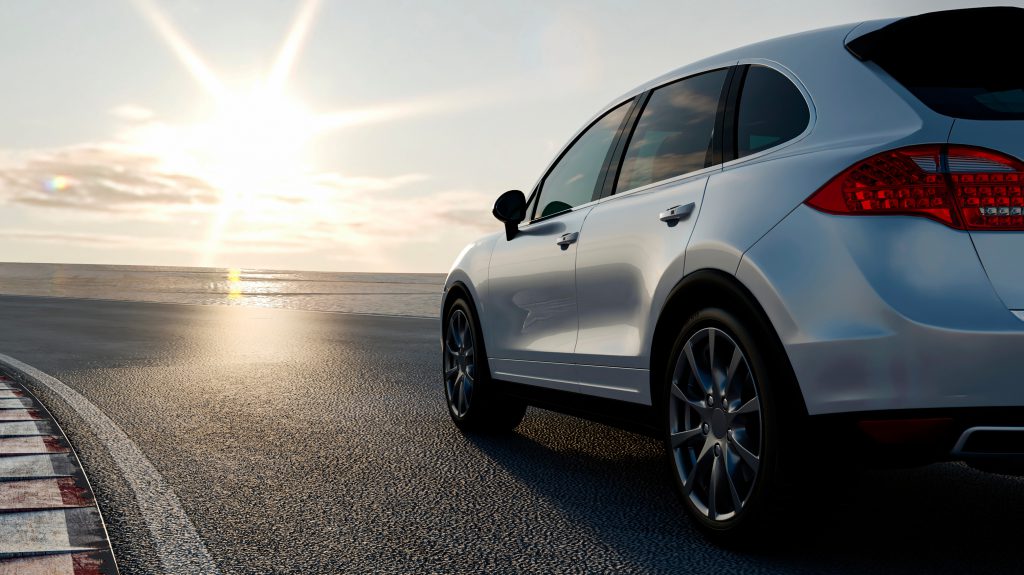 3d car sedan rides on the road to meet the sun, concept 3d rende